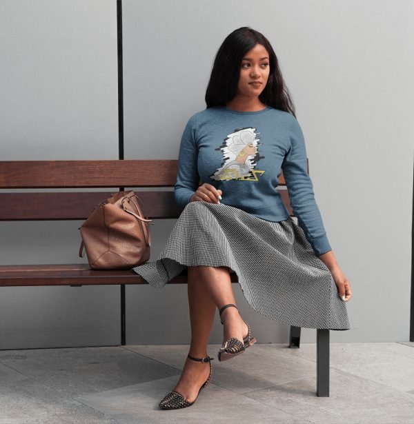 pretty-girl-wearing-kandaka-a-crew-neck-sweatshirt-template-while-sitting-on-a-bench