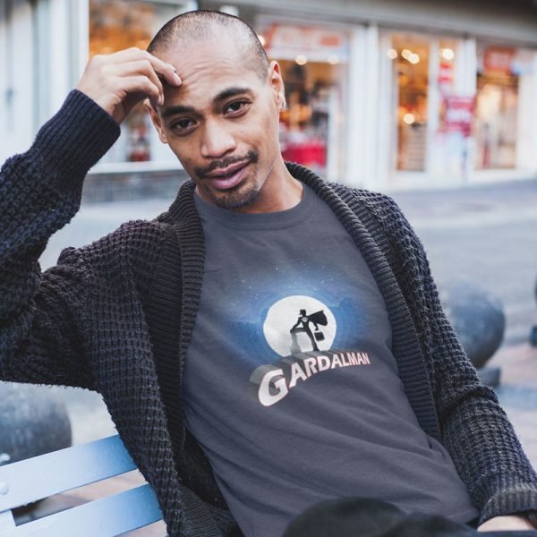 black-man-sitting-on-bench-street-wearing-med-night-gardal-man-t-shirt-dusan-shop