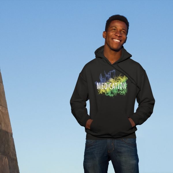 medication-hoodie-mockup-of-guy-standing-next-to-a-monument