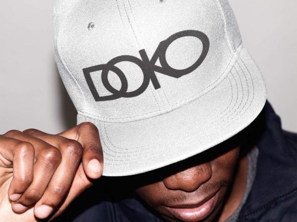 doko-snapback-snapback-hat-mockup-of-a-stylish-black-guy